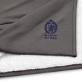 Gray and white blanket with Maison Riviera logo